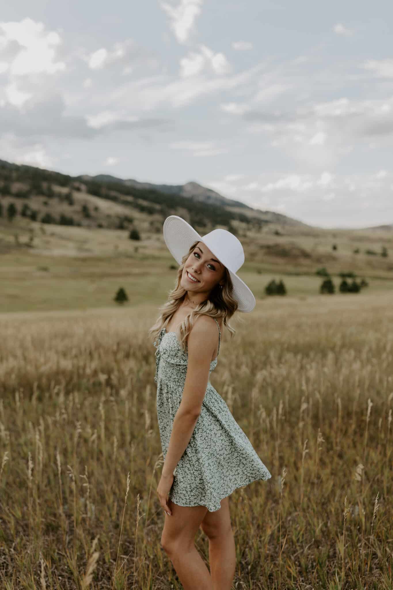 Lauren in a White Hat in a Field